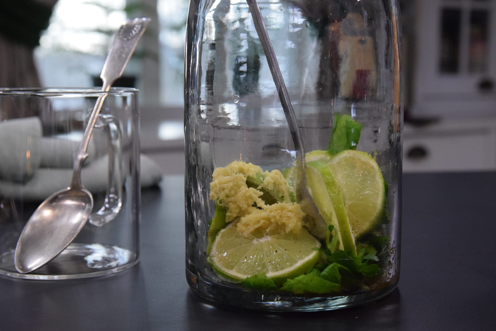 citrus fruit,food,fruit,lime,produce,cutlery,spoon,grapefruit,glass,can