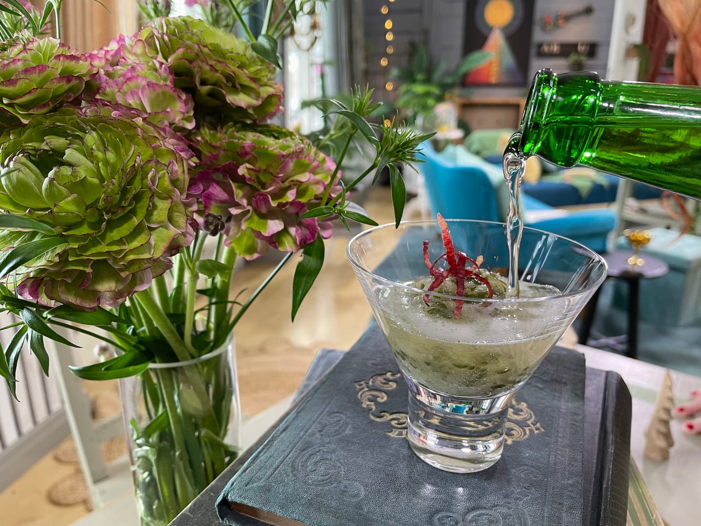 flower,flower arrangement,flower bouquet,glass,tabletop,cocktail,potted plant,beer,goblet,cup