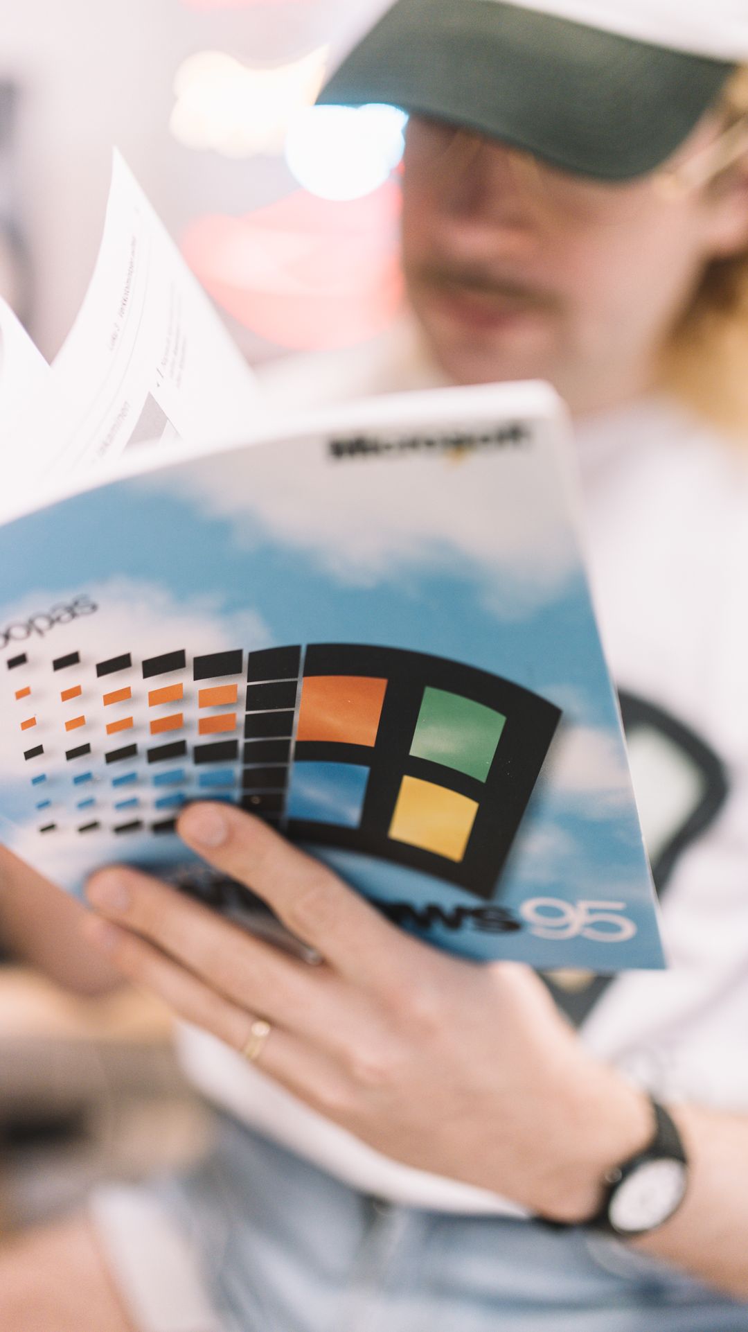 person,hat,finger,face,text,advertisement,girl,flyer,poster,portrait